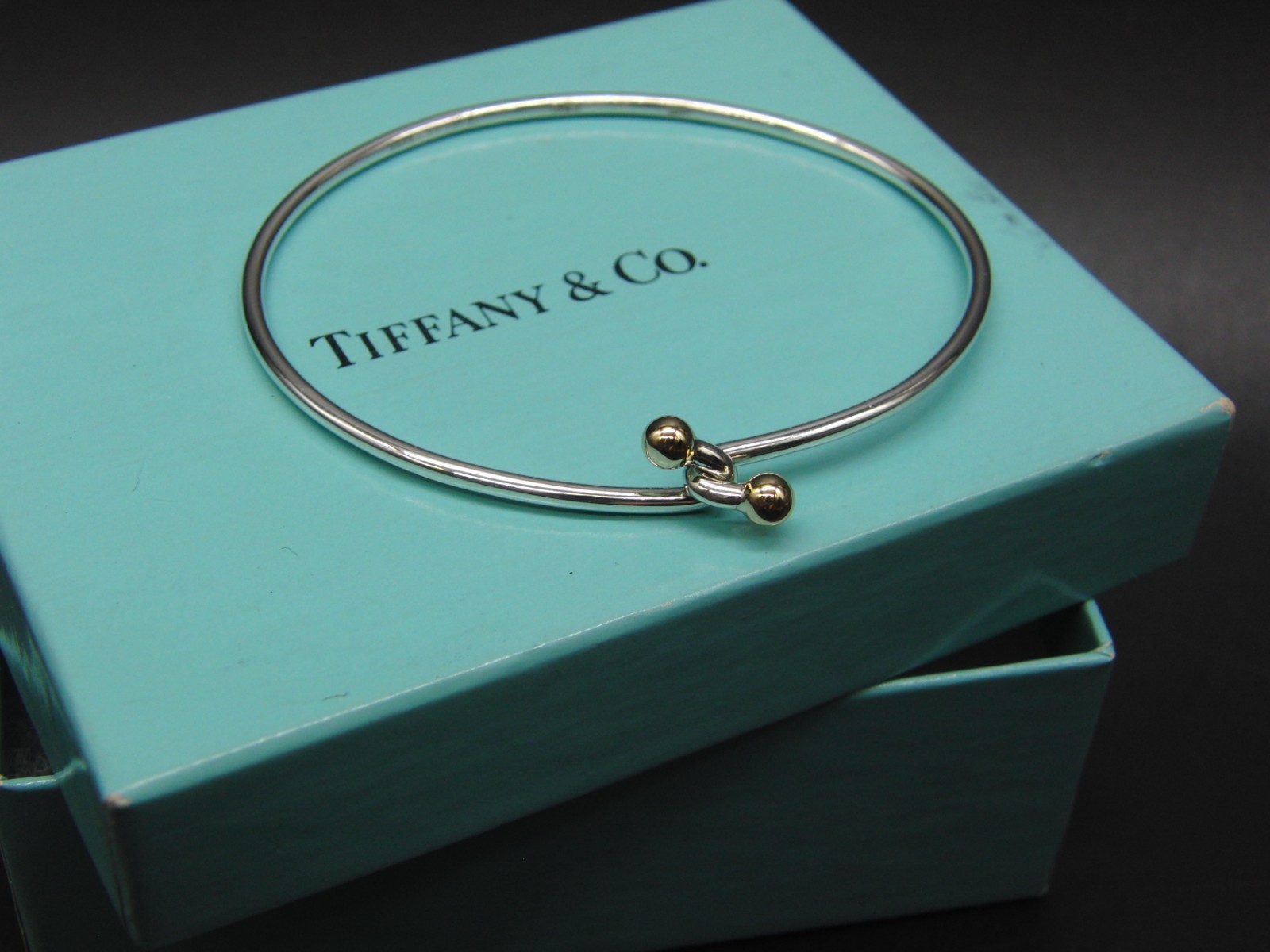 Tiffany & Co 18K Yellow Gold and Sterling Silver Love Knot Hook Bangle Bracelet