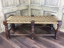 ANTIQUE LONG OAK STOOL / FOOTSTOOL WITH WOVEN SEAT & TURNED LEGS, 77cm LONG