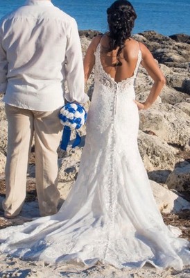 wedding dress size 4. White. Excellent condition. Unsure of brand.