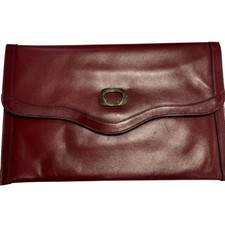 Vintage Etienne Aigner clutch. 1970s burgundy wine red leather I