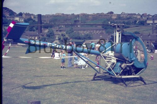 35mm 1975 Milnsbridge Helicopter  on field Huddersfield  - Picture 1 of 2