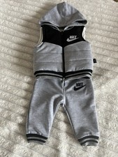 This item is a Nike infant boys' grey and black hooded 2-piece fleece jogger set