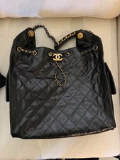 CHANEL 25 MEDIUM Black Quilted Drawstring Buc...