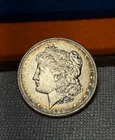 (#102628) Morgan Dollar: 1904 O  Unc  Rainbow rim toning both sides (See video!)
