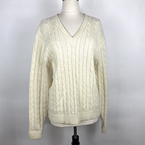 cream colored cardigan