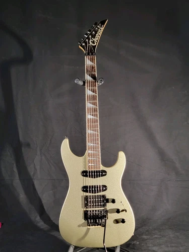 This is a 1990/1991 Charvel 475 Deluxe Metallic Green/Gold - AMAZING CONDITION