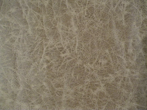 LEATHER LIKE FABRIC BROWN EMB MOLESKIN COFFEE #441675 COFFEE 100% POLY 4-3/4" YD - product listing photo