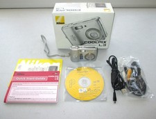 Nikon Coolpix L3 5.1MP Digital Camera Silver w/ Cables, CD, Box  GOOD COND! READ
