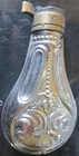 DECORATIVE SCROLL NICKEL PLATED BRASS PISTOL SIZE BLACK POWDER FLASK, USED