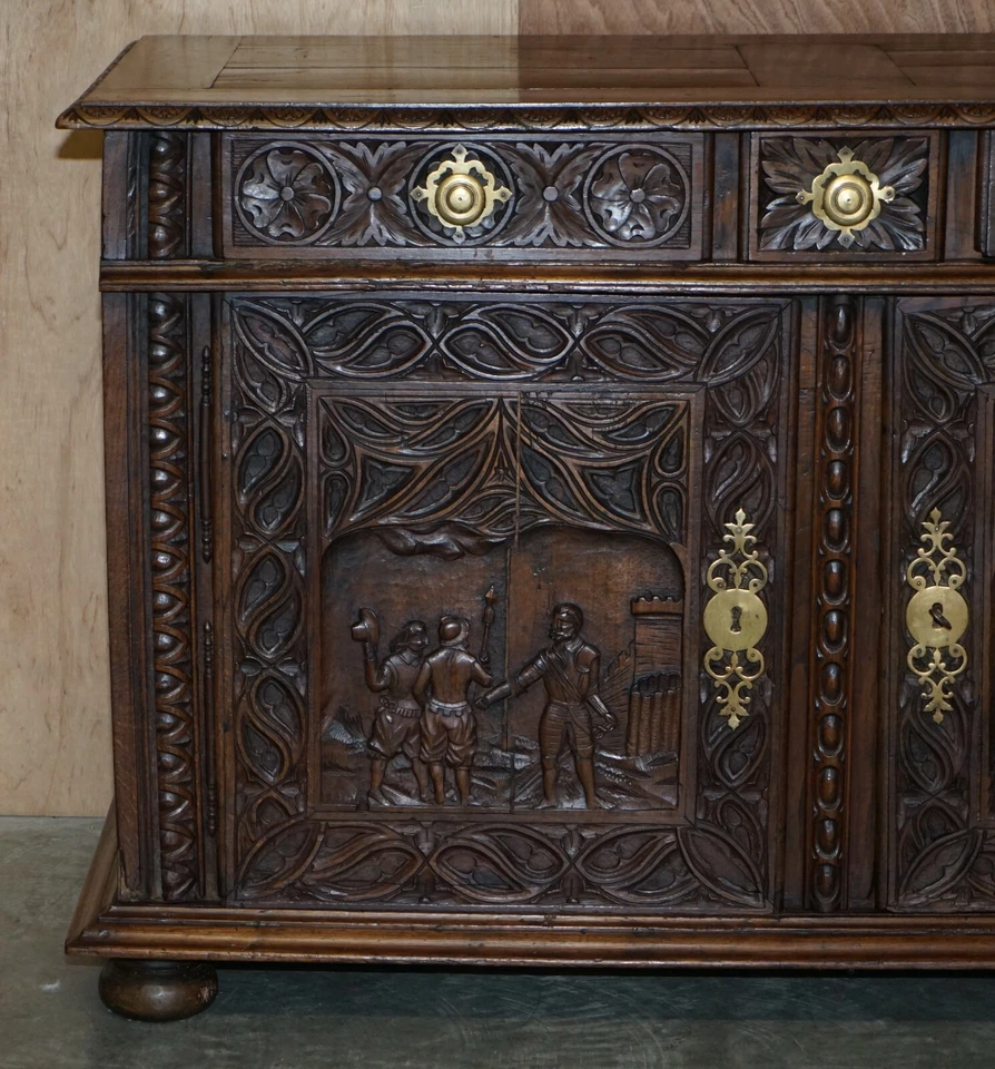 18TH CENTURY CIRCA 1740 HAND CARVED OAK SIDEBOARD WITH MILITARY CAMPAIGN SCENES - Image 3 of 4