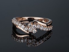 9ct rose gold Diamond ring; half eternity band ring with crossover bypass design