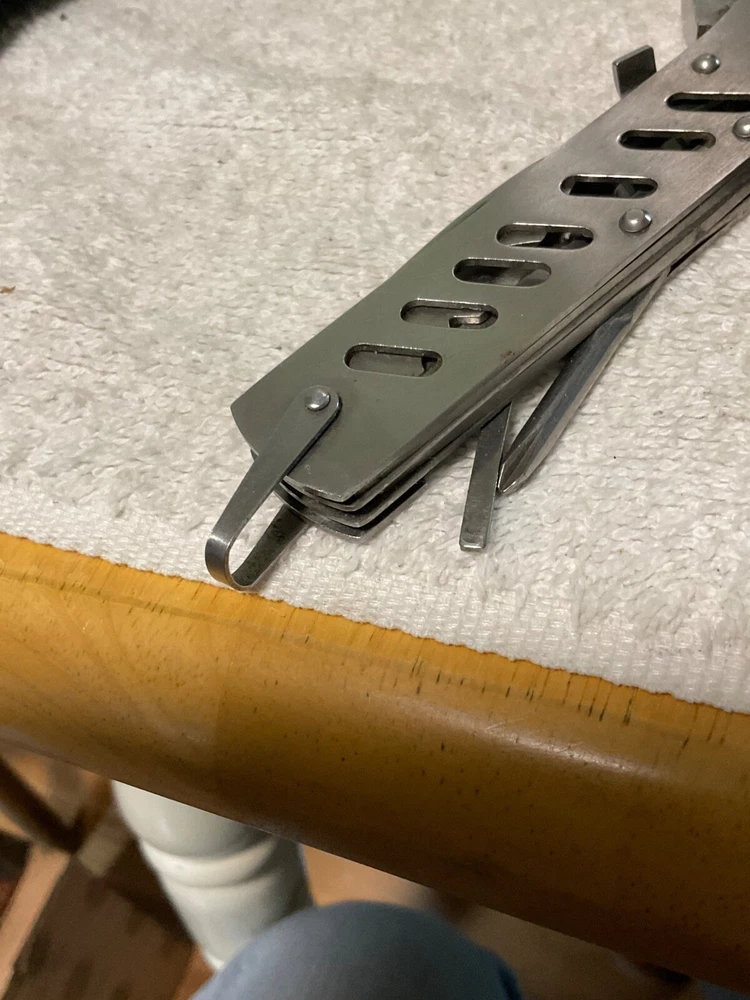 MULTI-TOOL WITH HOLDER. STAINLESS