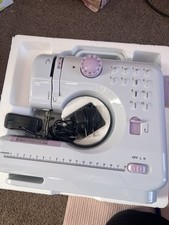 Mini Sewing Machine With Foot Pedal.