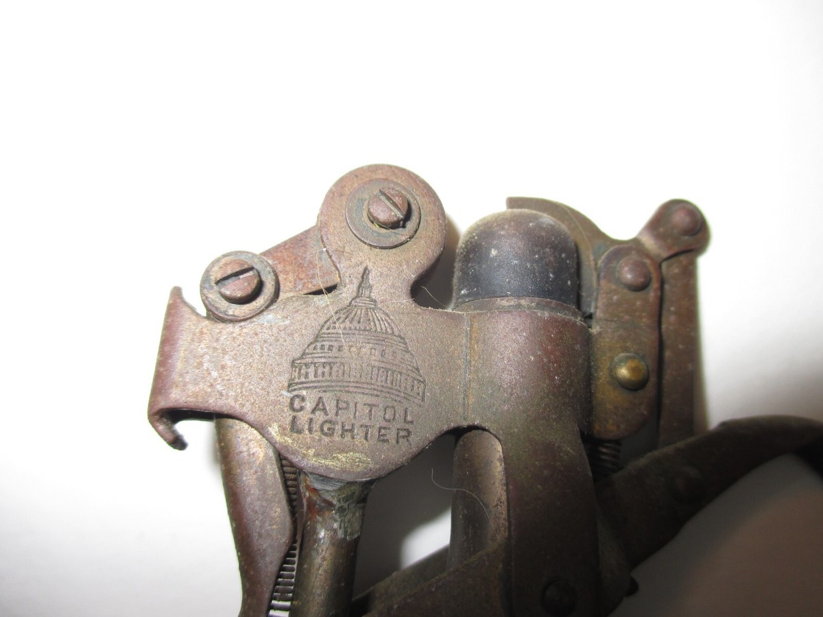 Antique Capitol Lighter with original base Ptd Sept. 17, 