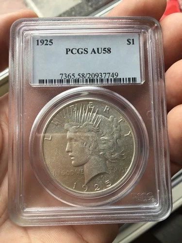 1925 PEACE SILVER DOLLAR PCGS AU-58