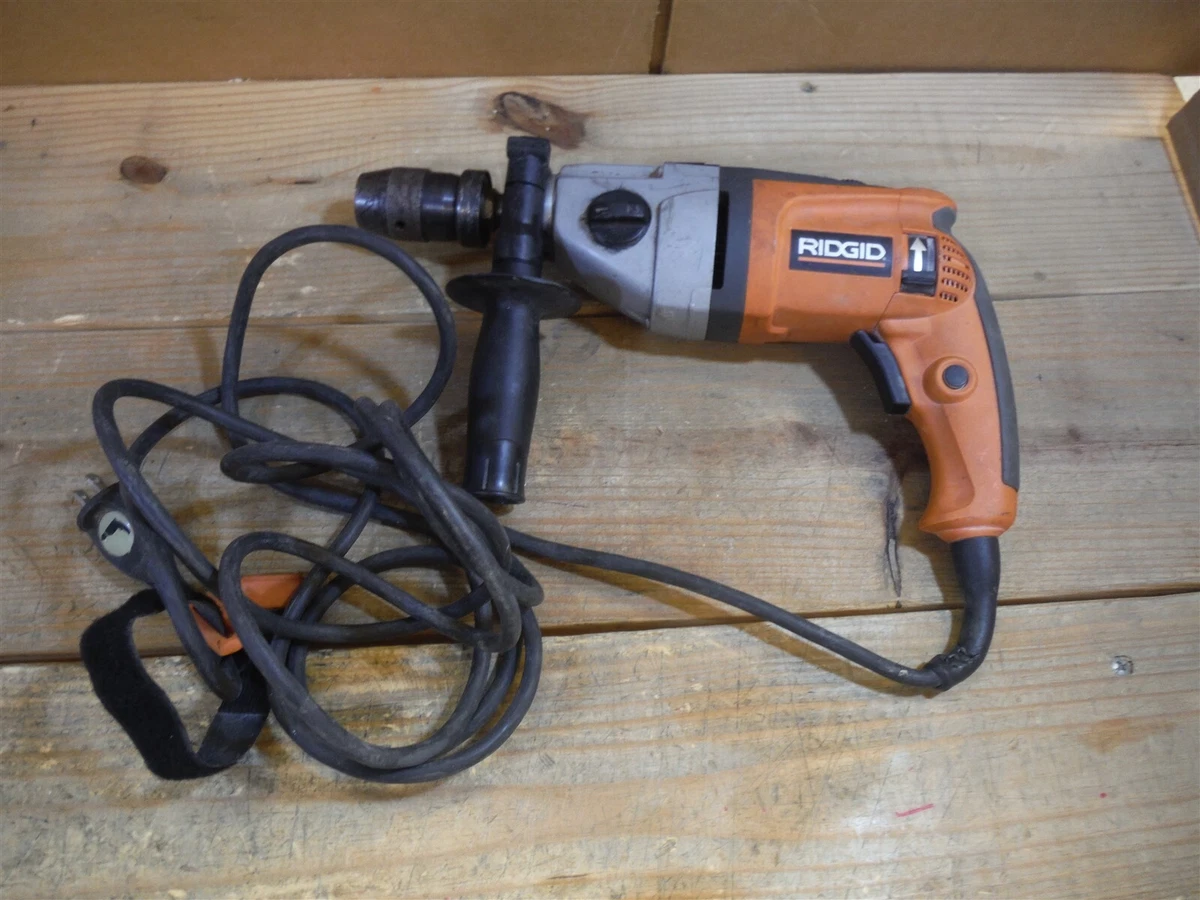 Pulsing hammer drill deals