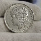 1887 O  US Morgan Dollar $1 AU (Cleaned)