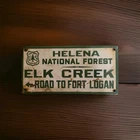 Vintage Helena-Lewis Clark National Forest Porcelain Sign Montana Texas Wyoming