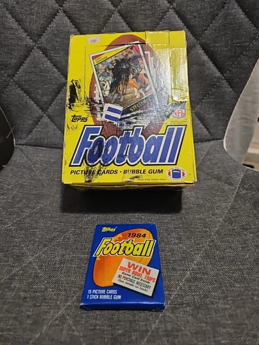 1 1984 TOPPS FOOTBALL Wax Pack poss Elway Marino RC + Empty wax pack BOX