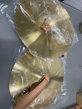 2 unused brass cymbals with handles