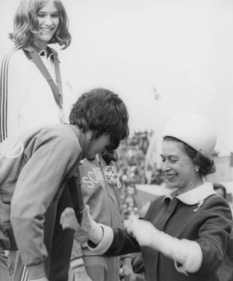 Queen Elizabeth II presents silver medal for High Jump to Ann Wilso- Old Photo