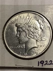 1922 $1 Peace Dollar  Uncirculated. Silver. Breaking high grade set. Lovely.