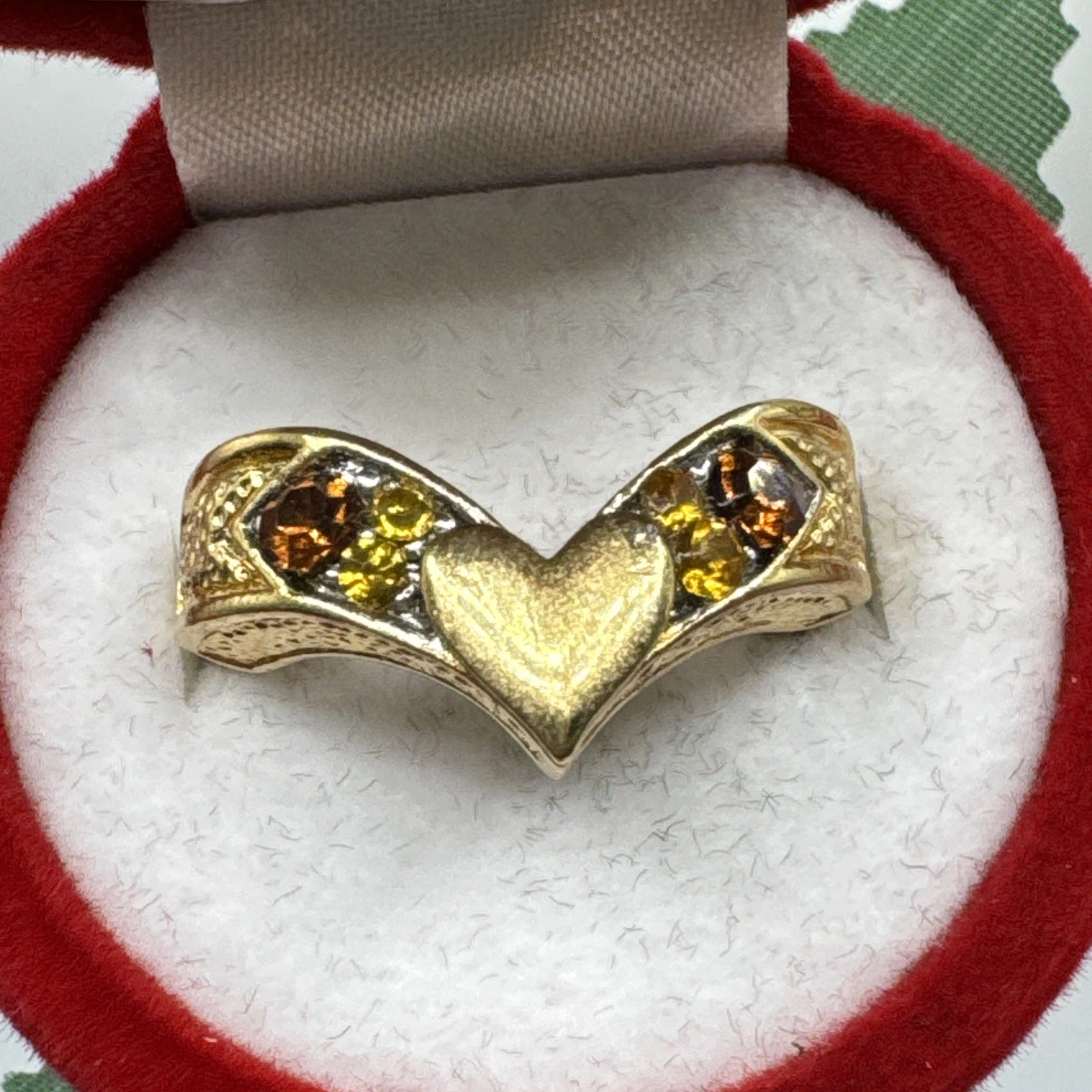 Bague vintage fantaisie cœur avec pierres orange claires et foncés. Taille 57.