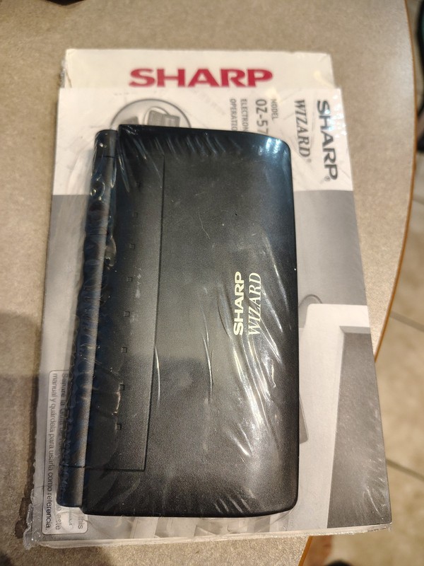 Vintage Sharp Wizard OZ-570 Electronic Organizer 256KB SEALED refurbed