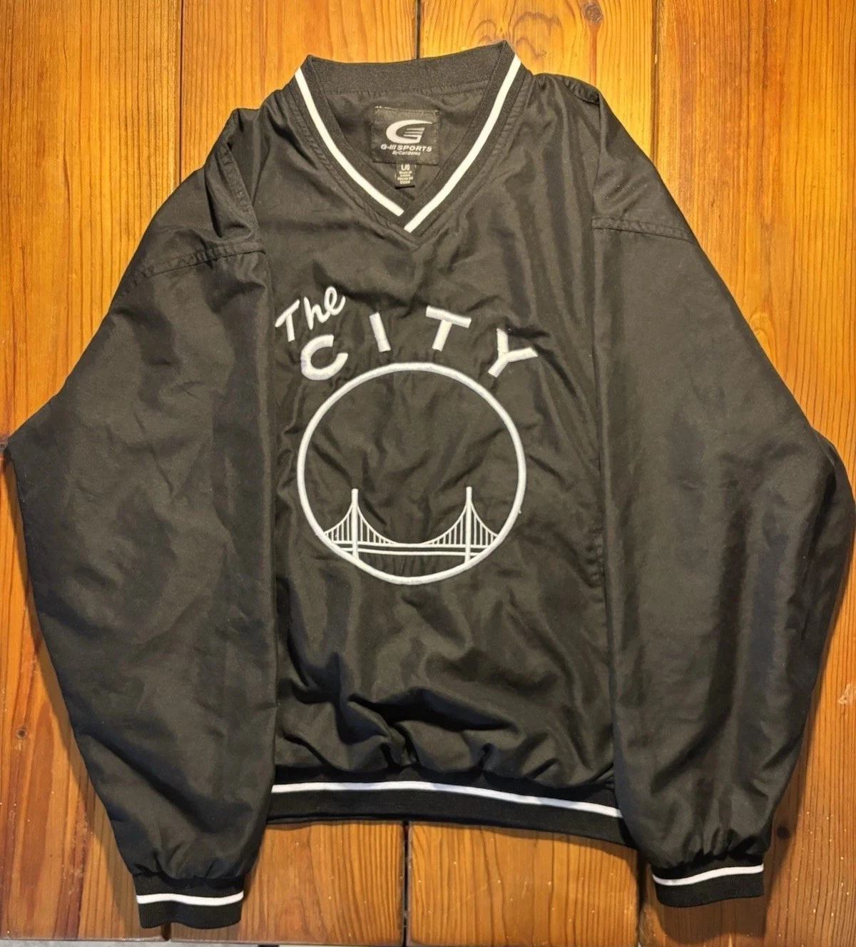 “The City” Windbreaker G-III Sports by Carl Banks (L)
