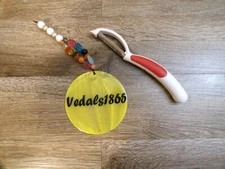 KUHN RIKON Piranha Swivel Peeler, White & Red 7.5" Long - Switzerland