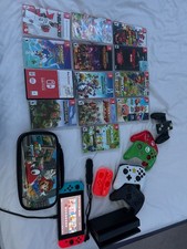 Nintendo Switch 32gb red and blue joy con with 1 wireless controller and 1 wired
