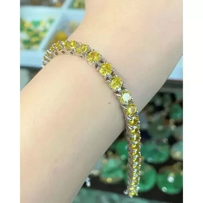 Brazalete tenis zafiro amarillo creado en laboratorio de corte redondo de 8 quilates enchapado en oro blanco de 14 quilates Foto 2 de 2