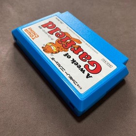 Famicom software with Garfield's One Week in the Box #408b8b