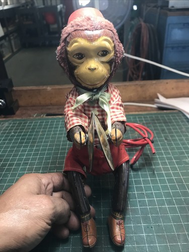 Vintage Japan Tin Monkey Playing 
