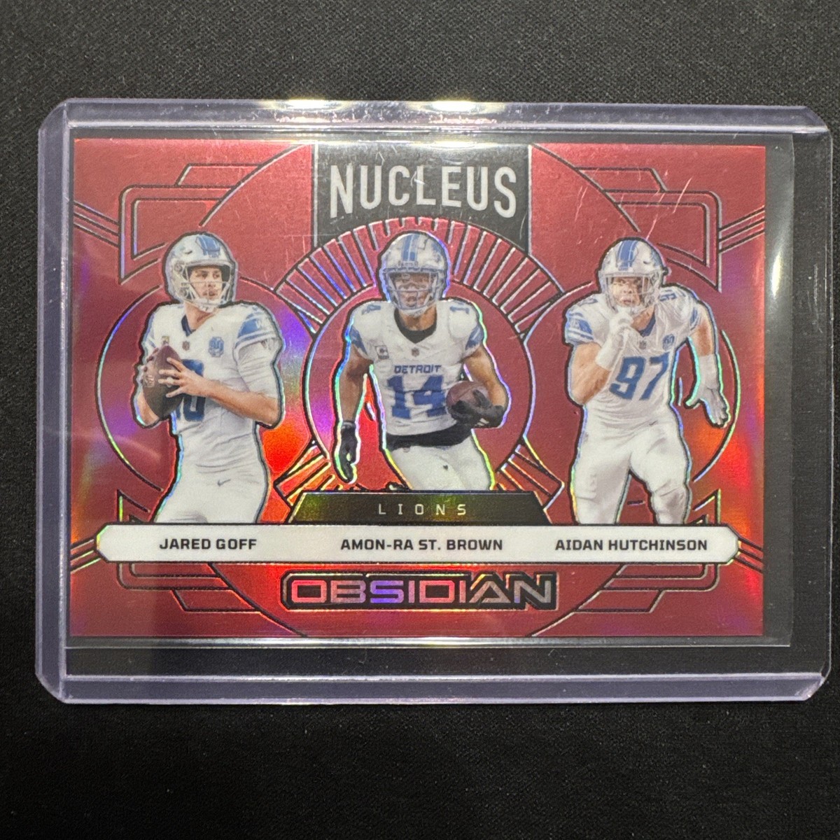 2024 Panini Obsidian - Nucleus Jared Goff, Aidan Hutchinson, Amon