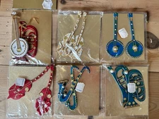 12 NOS VTG Moskatel's Gift Tie On Holiday Decorations  Japan Dresden 🎷🪕🎺🎶