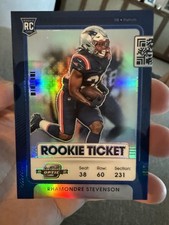 2021 Contenders Optic Rhamondre Stevenson RC Blue Rookie Ticket #/99 Patriots