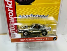 AUTO-WORLD X-TRACTION 1977 PONTIAC FIREBIRD T/A in CHROME  NEW Aurora AFX