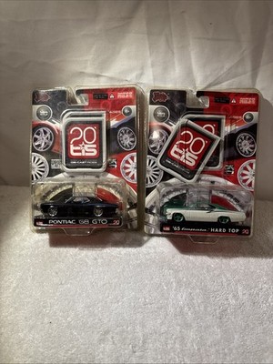 Malibu International 1:64 Lot Of 20  TIS Premium Die-Cast Cars New  2 Cars