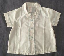 Vintage Toddlers white shirt & light blue shorts with braces.