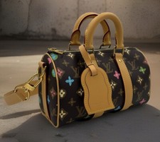 LOUIS VUITTON Keepall Bandoulière 25 Monogra...