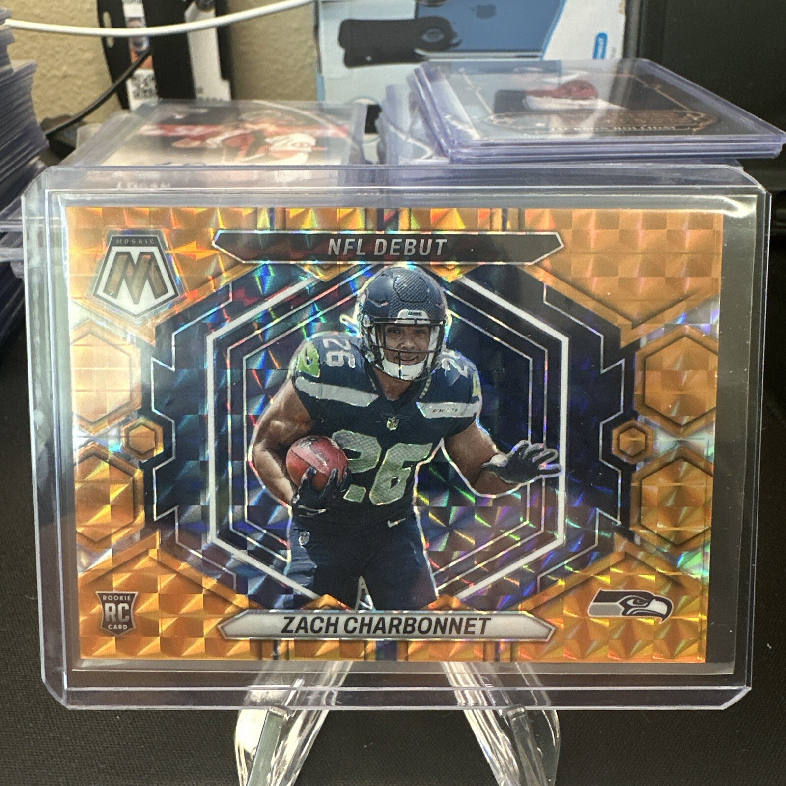 Zach Charbonnet 2023 Panini Mosaic NFL Debut #ND-11 Orange Prizm #’d 035/199 Rc