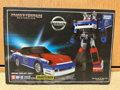 MP-19 Smokescreen Figur Transformers Masterpiece Takara Tomy Import