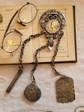 Victorian nickel plated brass chatelaine , belt clip and tools.