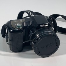 Nikon COOLPIX L100 10.0MP 15x Zoom Digital Battery Operated Camera Used Read