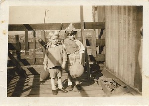 vintage photo boys wearing hat holding balloons