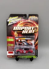 Johnny Lightning 1963 MGB Import Heat Racing Red Model JLSFO21