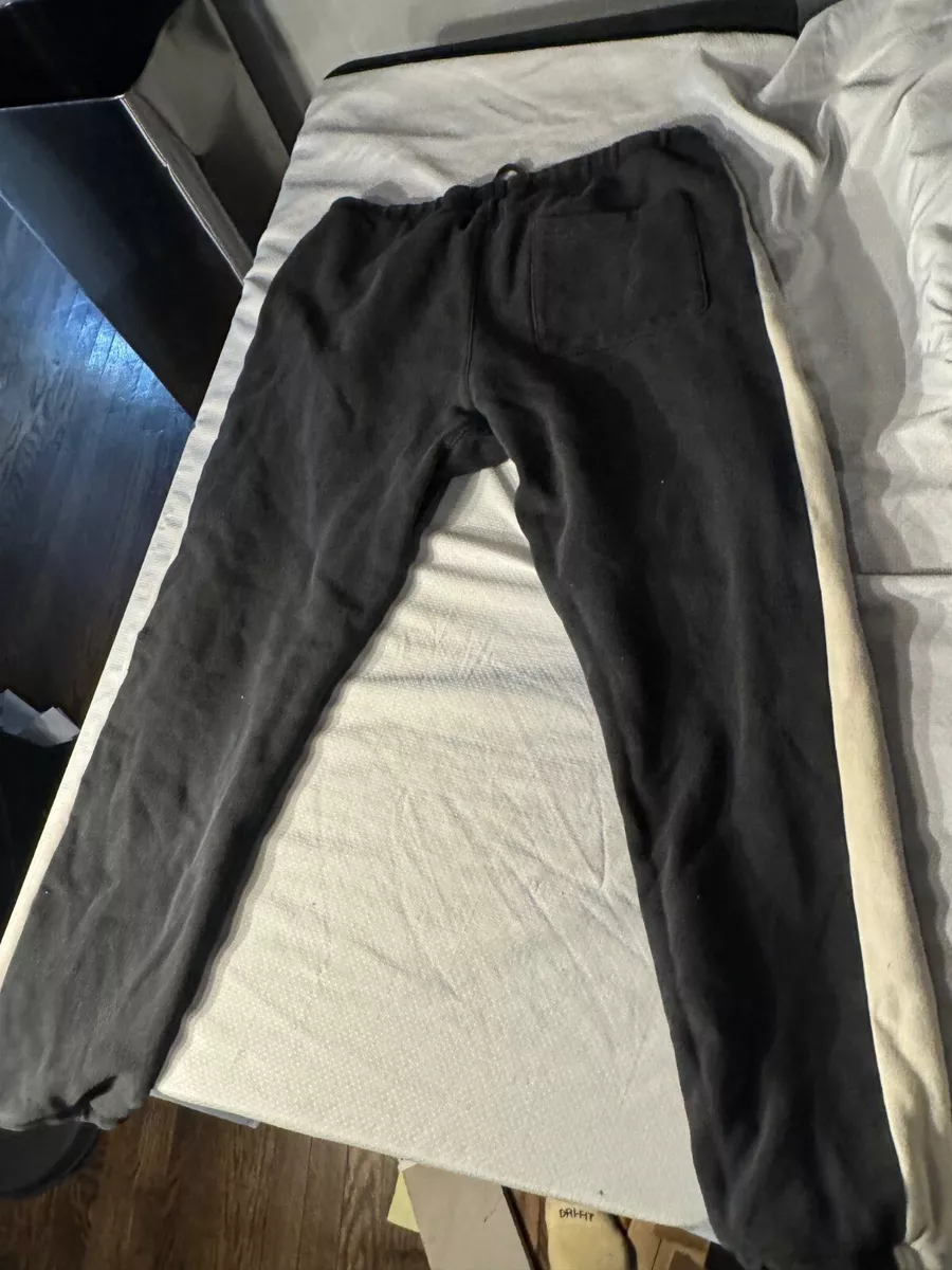 Fear of god essentials side stripe hotsell sweatpants black