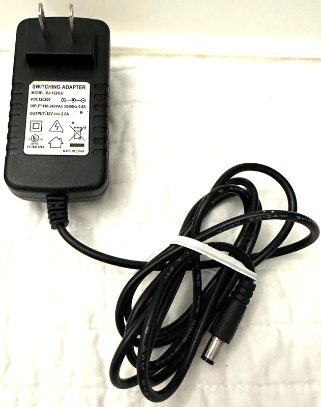 SJ-1220-U Switching Adapter Input 110-240 VAC 50/60 Hz 0.6 A Output 12 V DC 2.0
