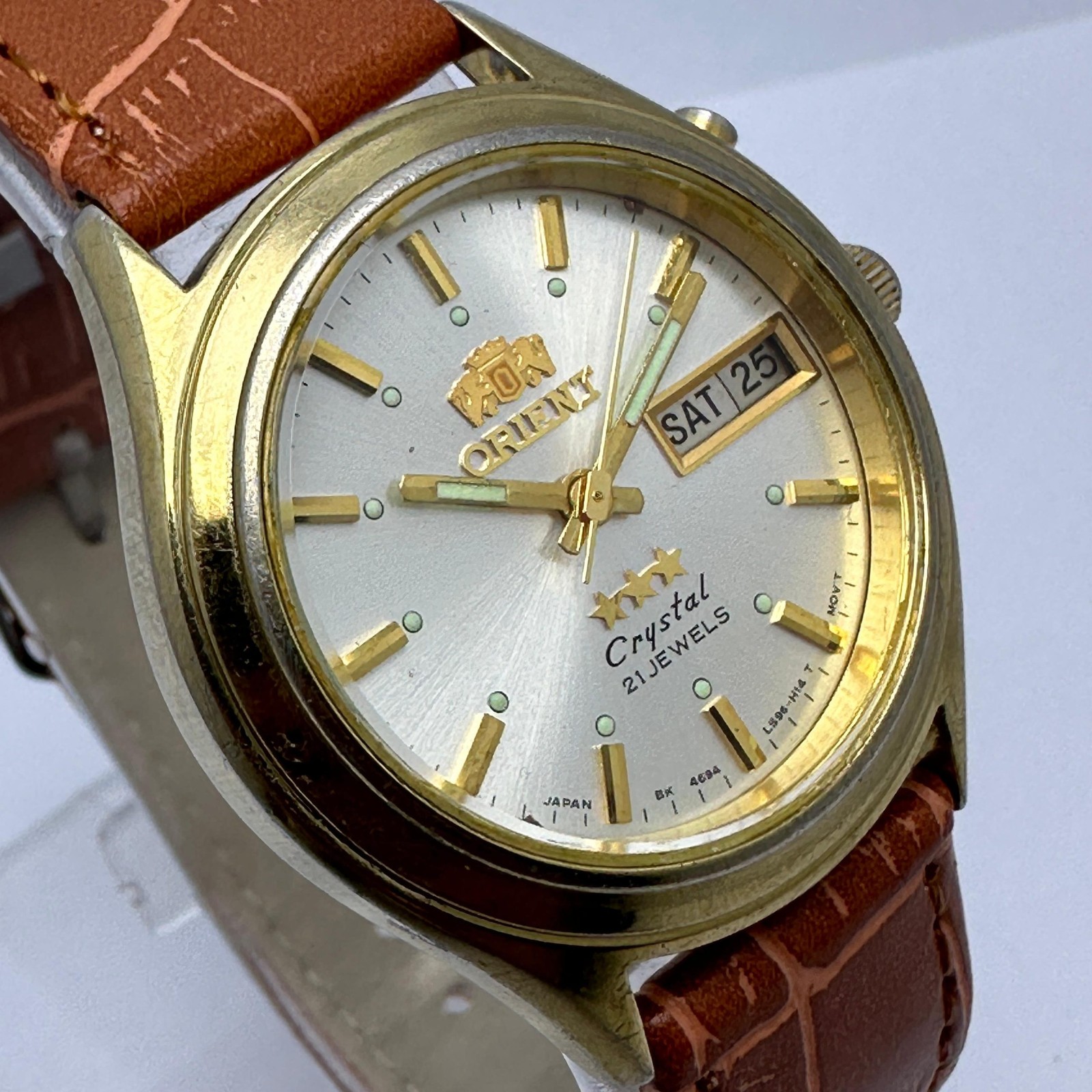 EM03-A0 Tri-Star RUB182SGB4 Orient Vintage Day/date Crystal Watch CA - VintageWatches.PK EM03-A0 Tri-Star RUB182SGB4 Orient Vintage Day/date Crystal Watch CA - vintagewatches.pk